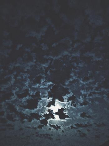Moon Surrounded By Clouds