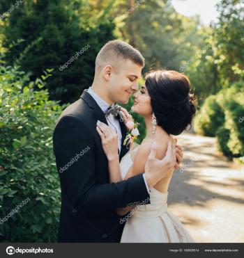 Newly Wedded Couple Hugging Trees Park — Stock Photo © LadanivskyyO ...