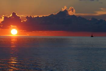 Stock Photography: Military Aircraft Carrier at Sunset in the ...