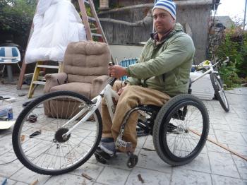 Front of wheelchair propped up on old bicycle seat, finding correct ...