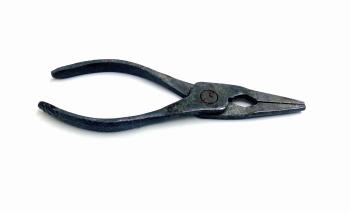 Old rusted metal needle nose pliers
