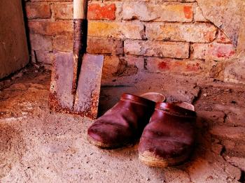Old shoes with shovel