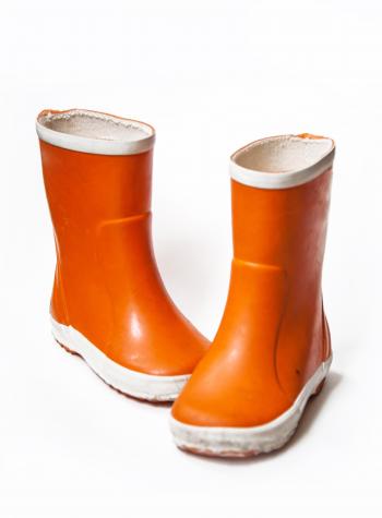 Orange children`s rain boots