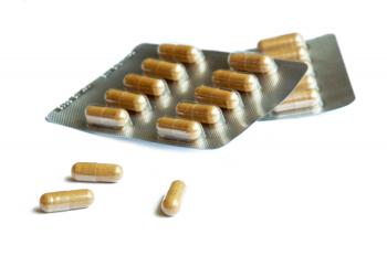 Packs of pills isolated on white