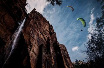 Paragliding over a waterfall