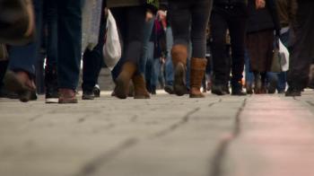 City People Walking on the Sidewalk. Individuals Wearing Jeans ...