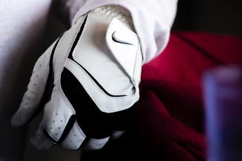 Person Wearing White And Black Nike Leather Glove