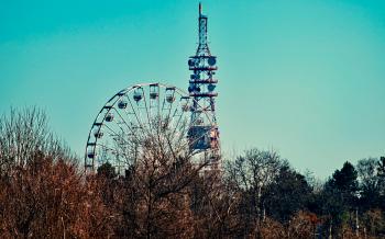 Photo of a Ferris Wheel Beside Tower