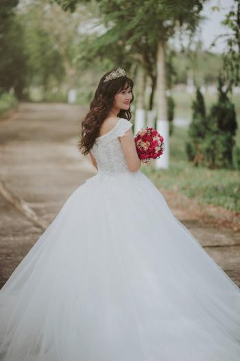 Photo of a Woman in Her Wedding Dress