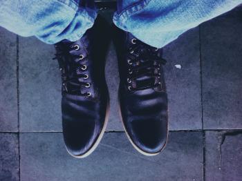 Photo of Man Wearing Black Leather Shoes