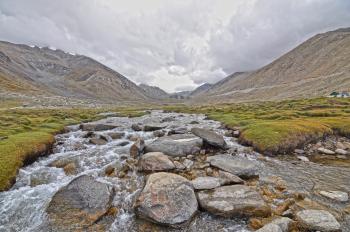 Photo of River Filled With Bolder Rocks