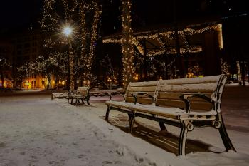 Photo of Snow Covered Benches in the Park