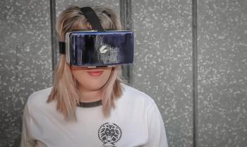 Photo of Woman Wearing Virtual Reality Headset