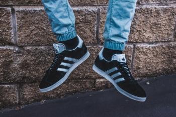 Photography of a Person Wearing Adidas Gazelle
