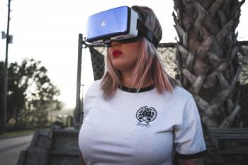 Photography of a Woman Wearing Virtual Reality Headset