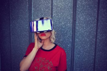 Photography of a Woman Wearing Virtual Reality Headset