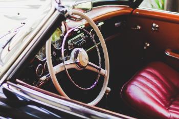 Photography of Red Leather Vehicle Interior