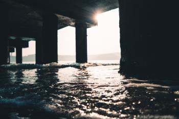 Photography of Sea Water Under The Dock