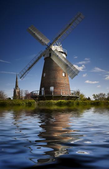 Photography of Windmill Under Blue Sky during Daytime