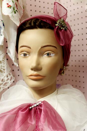 Pink bow on mannequin