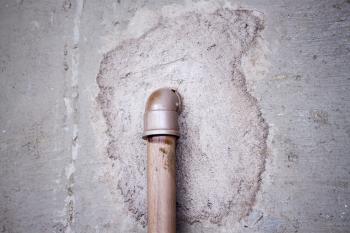 Pipe in wall