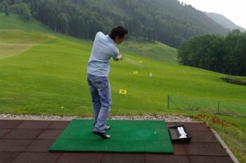Player practicing golf