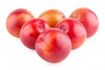 Plums isolated on white background
