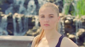 Woman posing in sunlight. Woman portrait outdoor. Caucasian woman ...