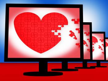 Puzzle Heart On Monitors Shows Love