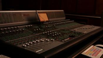 Film making, sound studio, audio console, moving faders, recording ...