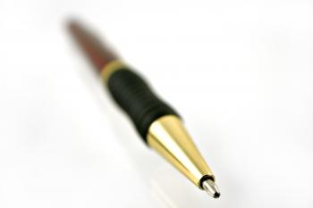 Red and golden pen out of focus