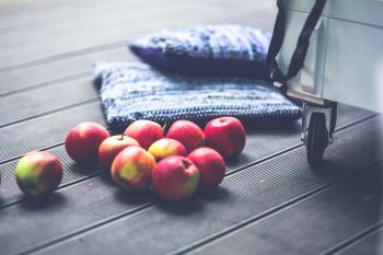 Red apples on the floor