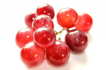 Red Globe grapes isolated on white