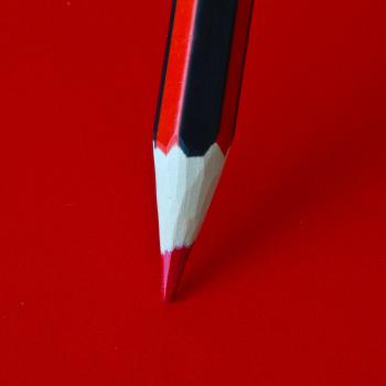 Red Pencil on a Red Surface