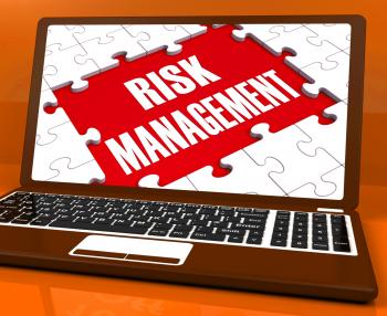 Risk Management On Laptop Showing Risky Analysis