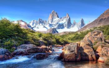 Rocky waterfall in front of the amazing rocky mountains wallpaper ...