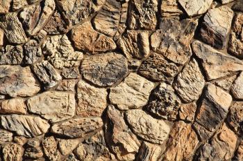 Stone Texture rock wall jagged rough brown masonry stock image ...