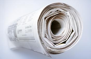 Rolled up Newspaper