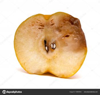 half of a cut out rotten pear on white background — Stock Photo ...
