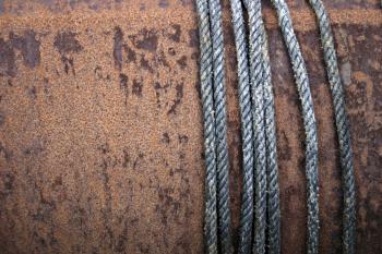 Rusted metal and ropes