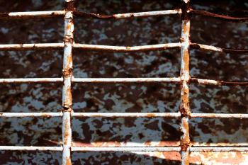 Rusted metal fence