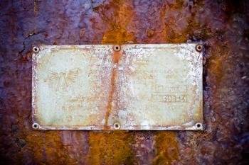 Rusted Sign on Metal Background
