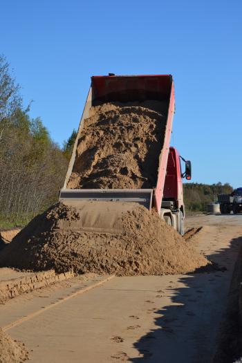 Sand pile and truck