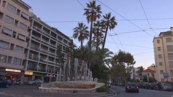 Traffic car street in San Remo city entrance sign by day residential ...