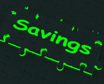 Savings Puzzle Showing Monetary Savings