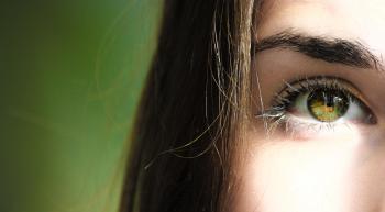 Selective Focus Half-face Closeup Photography of Female's Green Eyes