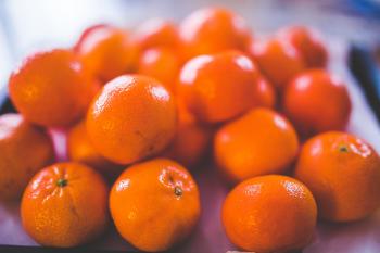 Shallow Focus Photography of Orange Fruits