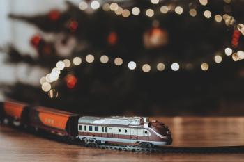 Shallow Focus Photography on Gray Train Plastic Toy