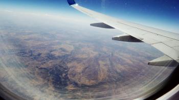 Traveling by plane. Beautiful view from the airplane window. Flight ...
