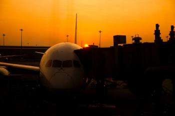 Silhouette of Airplane on Airport during Sunset